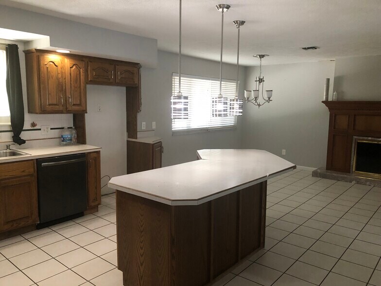Large eat-in kitchen with custom cabinets and all new appliances that including a refrigerator - 302 Coronation Dr