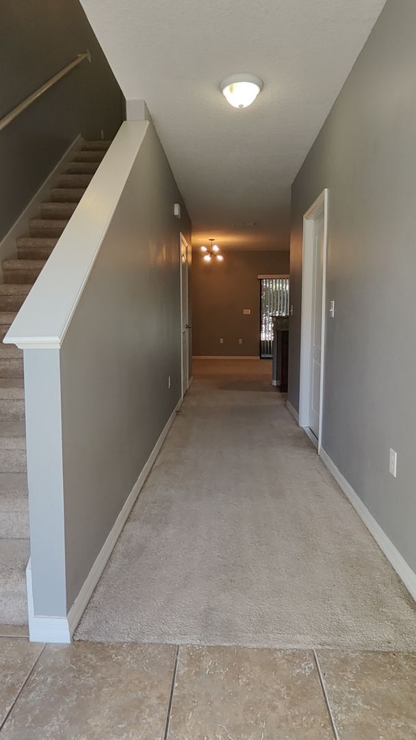 Building Photo - Prime Longwood Living 2-Bed, 2.5-Bath Townhome Near Shops & Dining