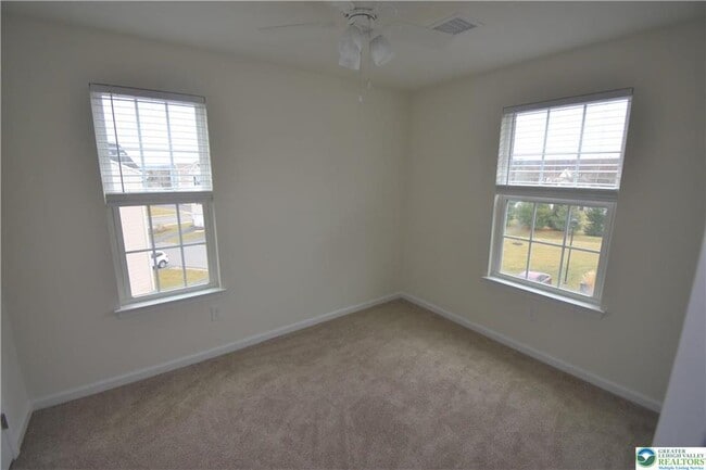 Building Photo - 12 Yellow Rose Ln