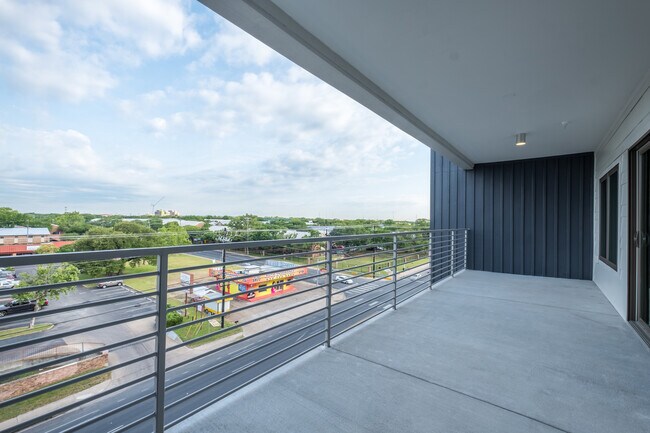 Building Photo - South Austin 2BR Condo with Balcony & Luxury Amenities