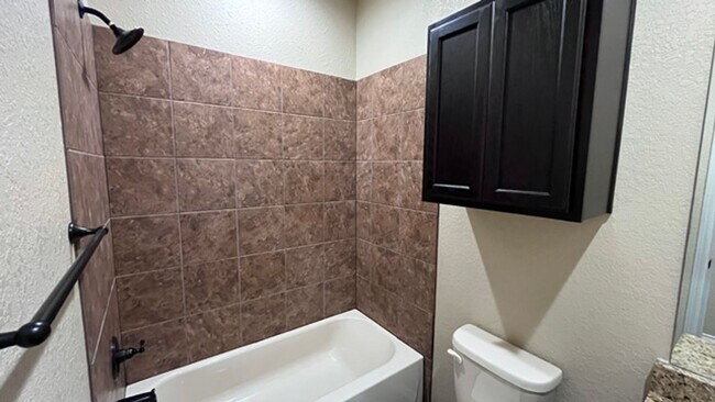 Building Photo - Granite Counters, High Ceilings & More – S...