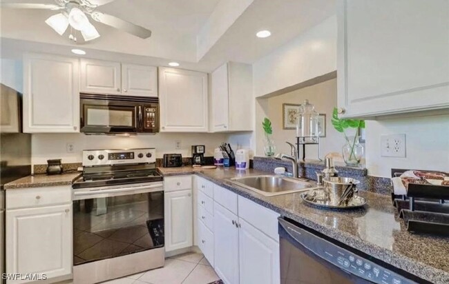 Building Photo - 4912 Tamiami Trl E
