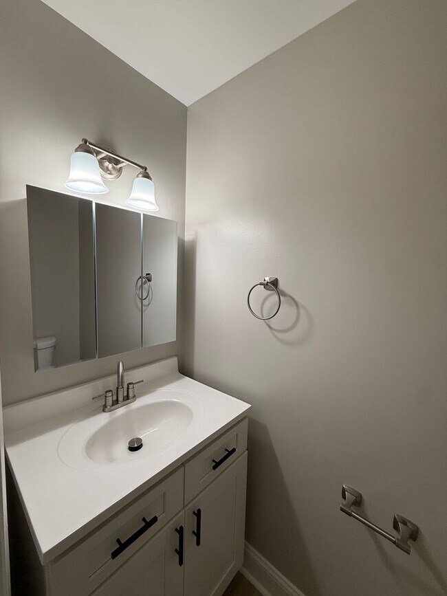 Building Photo - New Everything 4BR Townhome with Private Lower Level Suite | Stainless Kitchen | LVP + New Carpet...