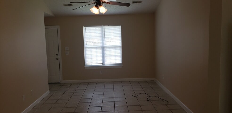 Living room facing front window - 560 Snow Hill St