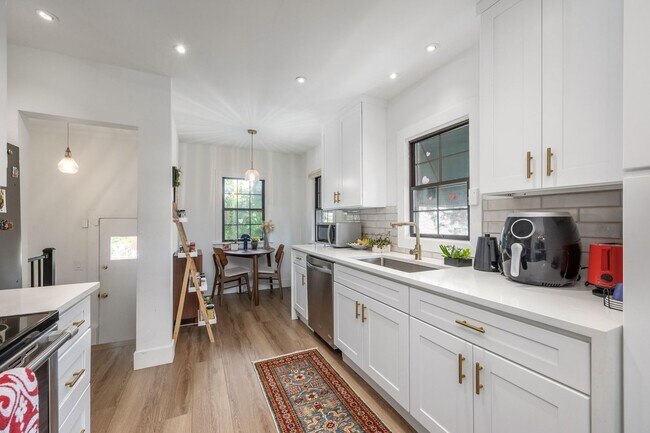 Building Photo - Charming 1935 Tudor in 15th & 15th – Renovated with Modern Luxury
