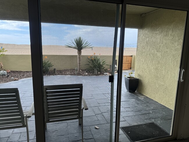 patio and beach view from Living room - 7015 Trolleyway