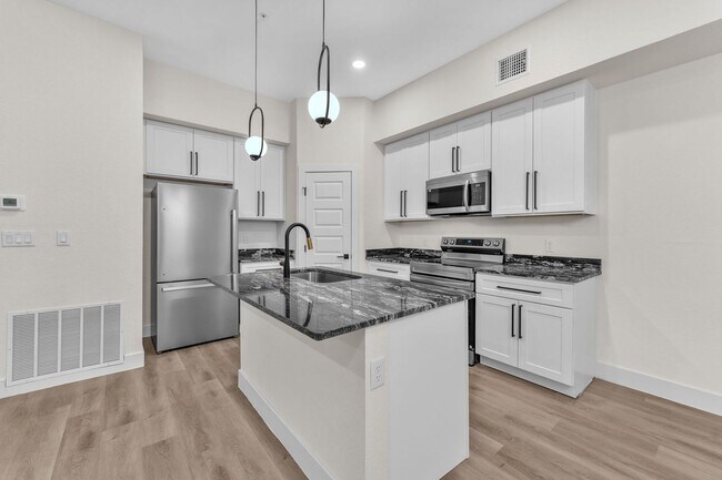 Building Photo - All Units Are Available With Brand NEW Full Appliance Package