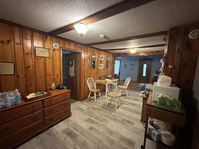 Building Photo - Charming 3BR Waterfront Retreat with Sunroom, Brick Accent & Scenic Lake Views