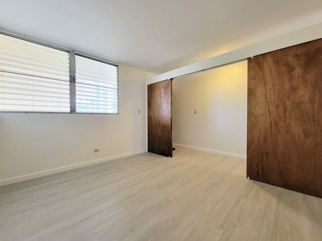 Building Photo - Available Now: A 1 Bedroom, 1 Bathroom Condo with 1 Assigned Parking Stall