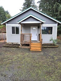 Building Photo - Large lot with tons of storage !  3 br , 2 bth + office+ 2  Car-garage + 2 Wooden Sheds