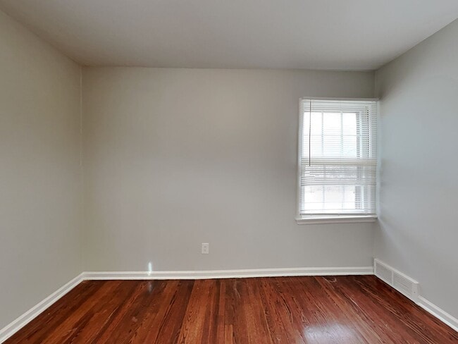 Building Photo - Spacious 4BR Home with Finished Basement, Fireplace & Unique Layout