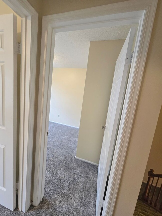 Building Photo - Recently painted & carpeted townhouse with 1,200+ SQ FT, 3-bedroom, 2.5 bathroom and lots of amen...