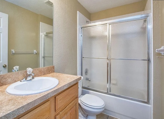 Building Photo - Charming 3/2 with large fenced yard!