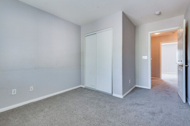 Building Photo - Very nice kept two-story 3 bedroom 2 bath house in a small gated community on the east side