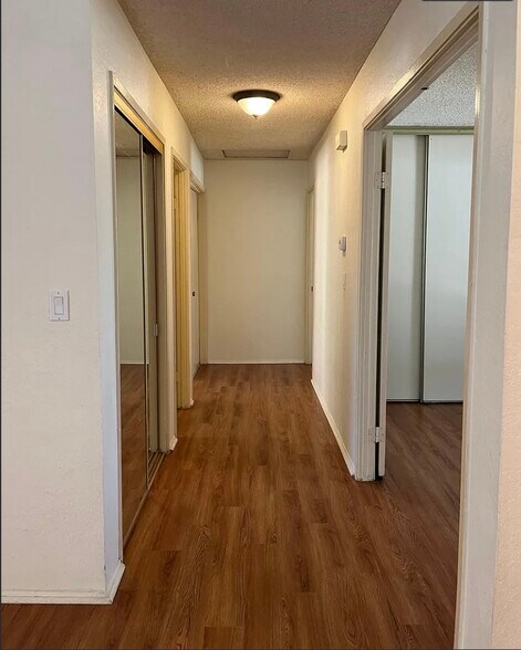 3 bedrooms off of hallway with lots of linen storage - 10431 Santana St