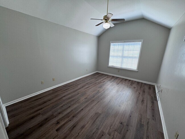 Building Photo - Quiet 3/2 Home with attached garage and fenced yard