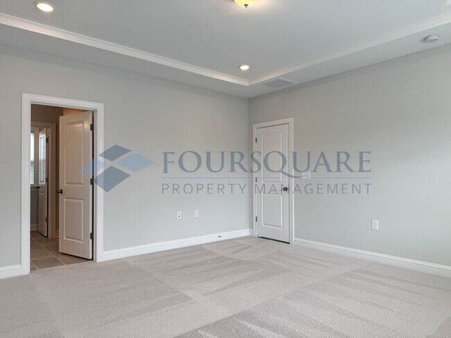 Building Photo - Spacious Corner-Lot Home with Guest Suite, Screened Porch & Detached 2-Car Garage – Resort-Style ...