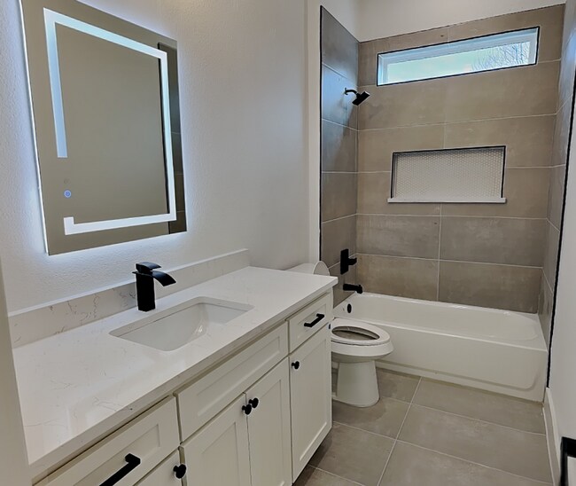 Building Photo - Brand New Modern Luxury with Soaring Ceilings & Designer Finishes!