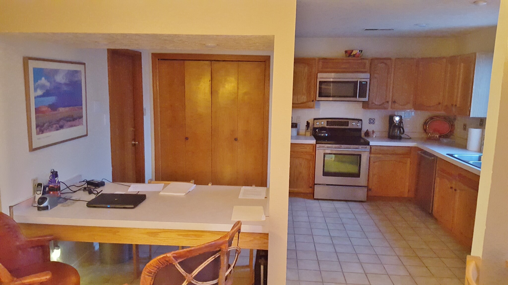 Here is the kitchen with the four person breakfast nook. In the distance is the laundry area. - 6436 Saint Josephs Ave NW