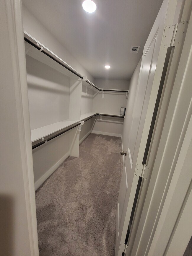 Primary closet - 20535 Prairie Cypress Dr