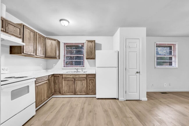 Building Photo - Cozy 3BR Home with Spacious Yard & XL Carport!