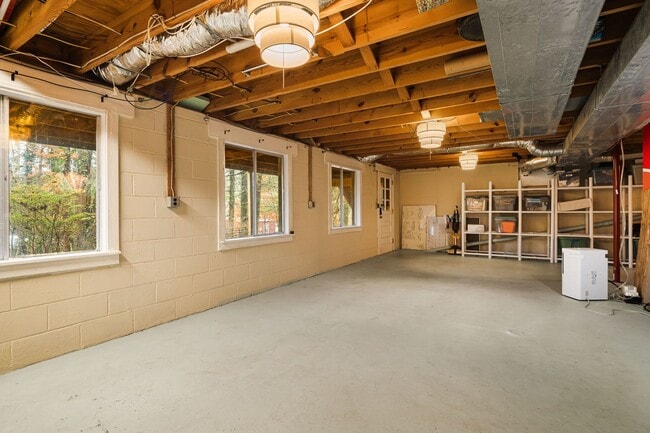 Building Photo - Rural Retreat in Candler with Bonus Room (Heat, Water, & Lawn Maintenance Included)