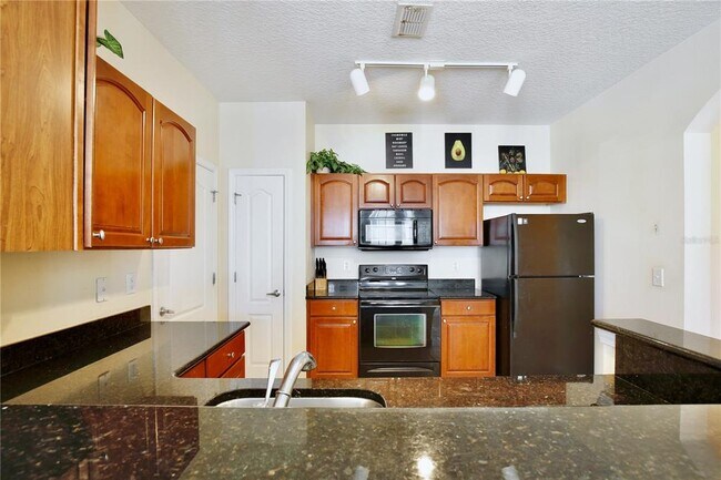 Building Photo - 5255 Cane Island Loop