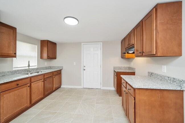 Building Photo - Move in Promo- $300 off First Month's Rent! Renovated 3BR Gem in Dora!