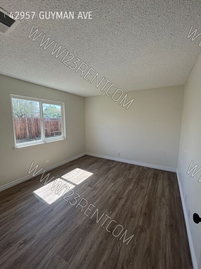 Building Photo - 42957 Guyman Ave