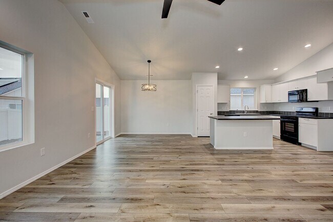 Building Photo - The 3 bedroom, 2 bedroom home also has a f...
