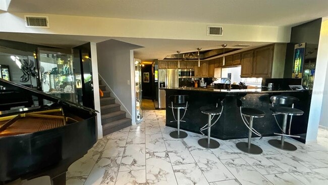 Building Photo - 1635 Royal Palm Dr S