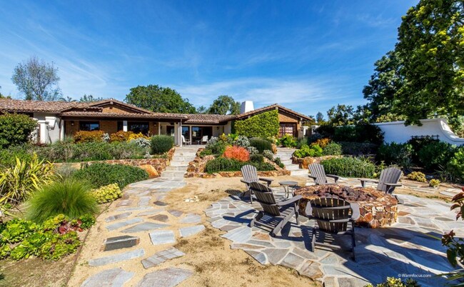 Building Photo - This Beautiful Hacienda Style Home combine...