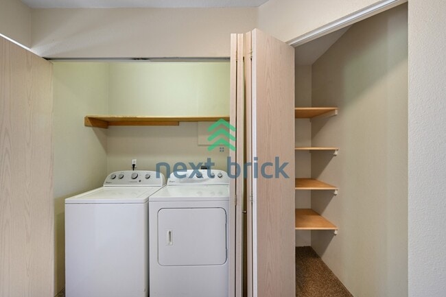 Building Photo - Spacious 3-Level Condo with 2-Car Garage, Mt. Rainier Views & Turnkey Comfort in Bonney Lake