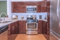 Comtemporary Kitchen with ALL Stainless Steel Appliances - Woodley Sara