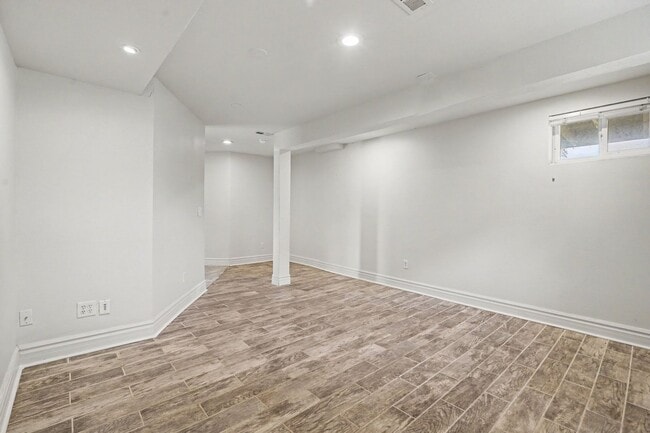 Building Photo - Spacious 4-Bedroom, 2-Bath Home with Large Yard, Garage & Central A/C
