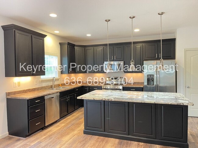 Building Photo - COMING SOON Modern 4BR Home