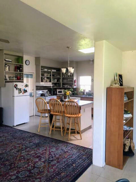 The kitchen, as viewed from the same place. Kitchen was re-designed and upgraded 5 years ago - 804 NW 29th St