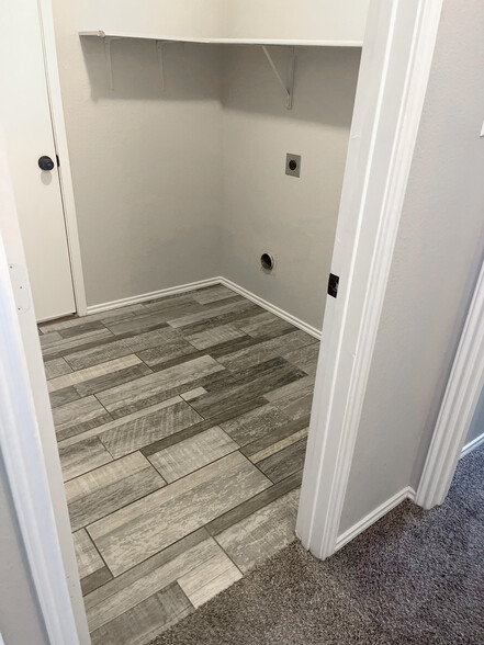 Laundry Room - door to garage. - 1419 Windy Meadows Dr