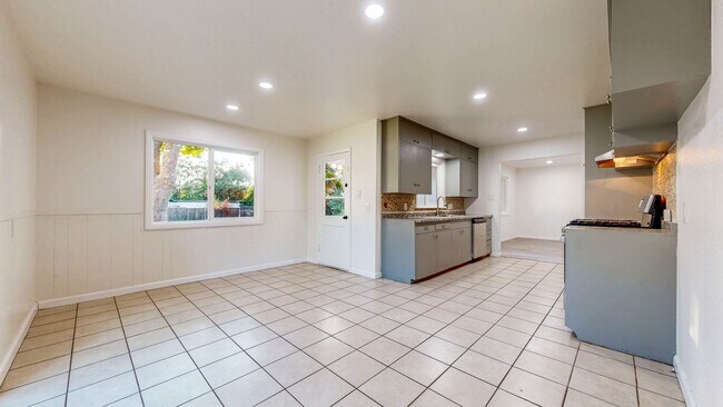 Building Photo - Bright & Clean Single Level FIVE bedroom i...