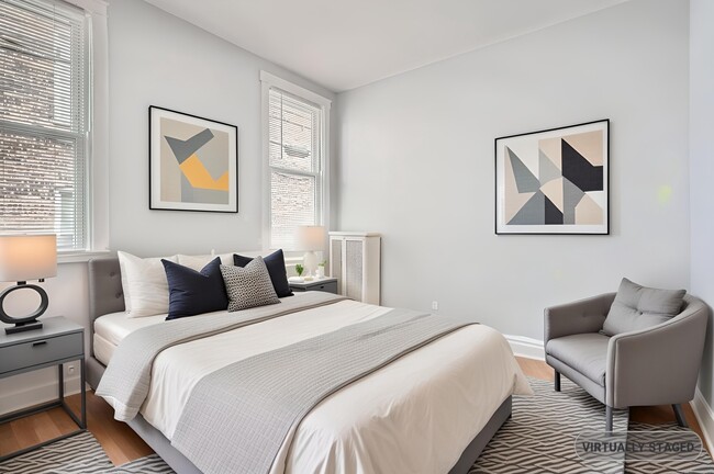 Building Photo - 7449 S Vernon Ave