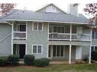 Building Photo - ONE LEVEL CONDO NEAR REX HOSPITAL -Firepla...