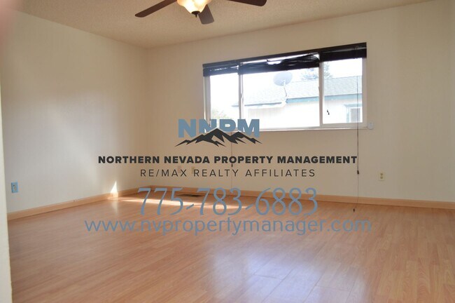 Building Photo - $2200 ~ 4 Bed ~ 2 Bath ~ Large Home on Corner lot off of S McCarren in Donner Springs Neighborhoo...
