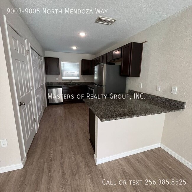Building Photo - 9003-9005 North Mendoza Way-