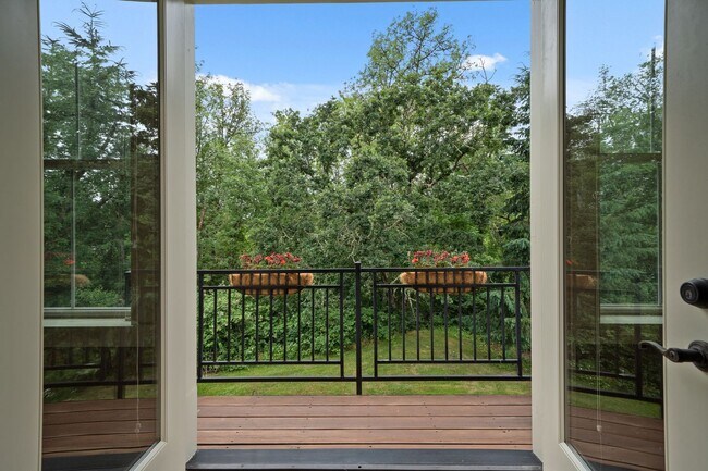 Building Photo - 2 Creeks Condominiums - Gated Community on...
