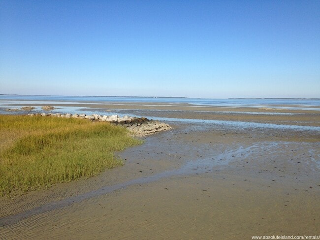 Building Photo - Beach Access, Bike Rides, Coastal Comfort.
