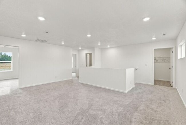 Building Photo - Spacious 5-Bedroom with Loft with 3-Car Garage