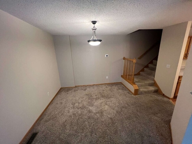 Building Photo - Spacious 3BR/1.5BA Townhome with Attached ...