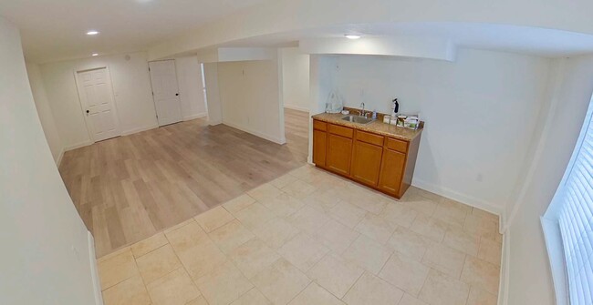 Building Photo - HUGE Backyard + Amazing Patio + Pet Friend...