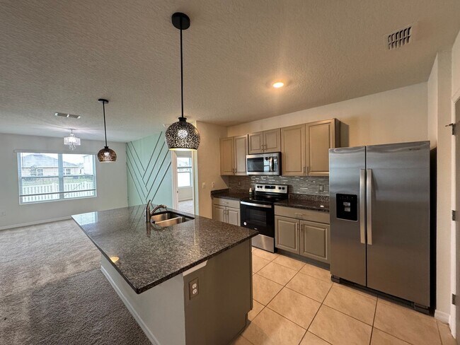 Building Photo - 3BD/2BA Modern Florida Home Living Reimagined — Solar-Powered Elegance Near I-95 in Edgewater! FU...