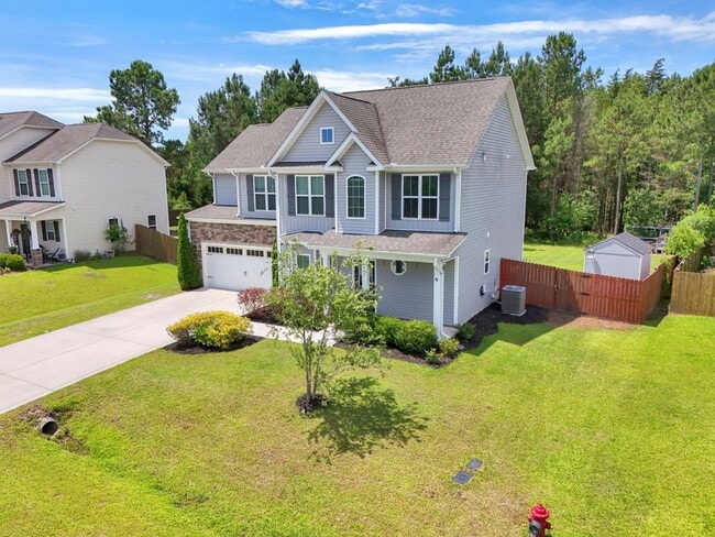 Building Photo - 4 bedroom 2.5 bathroom home close to beaches, shopping, and Marine Corps Bases.